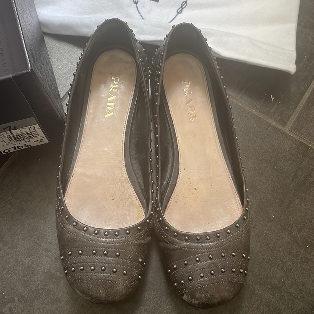 Prada size 7.5 grey gunmetal studded flats.